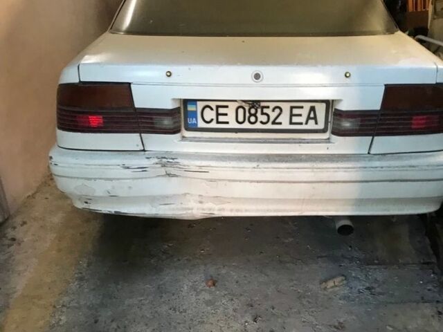 Белый Мазда 626, объемом двигателя 2.18 л и пробегом 300 тыс. км за 800 $, фото 1 на Automoto.ua