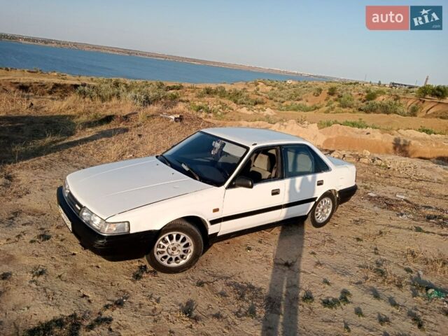 Белый Мазда 626, объемом двигателя 2 л и пробегом 300 тыс. км за 2000 $, фото 1 на Automoto.ua