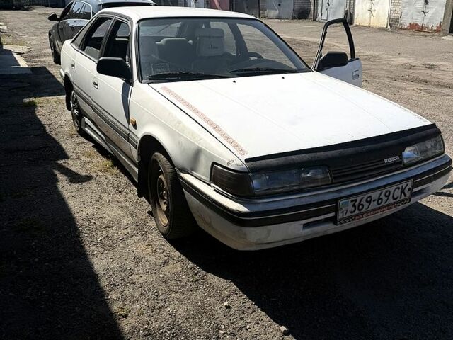 Білий Мазда 626, об'ємом двигуна 2 л та пробігом 200 тис. км за 600 $, фото 1 на Automoto.ua