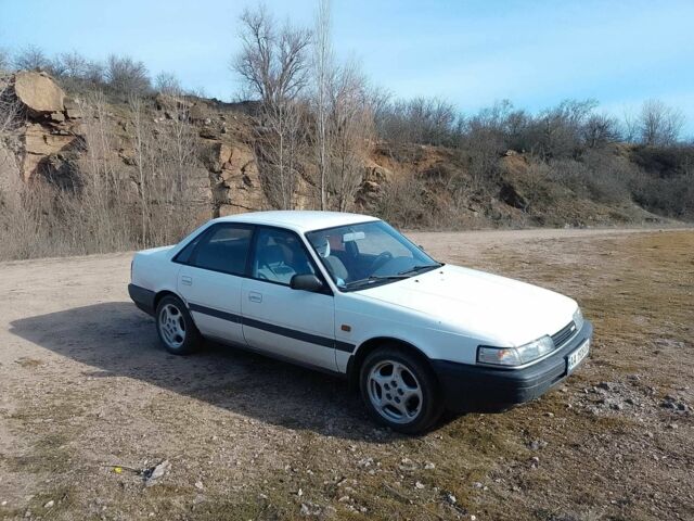 Белый Мазда 626, объемом двигателя 2 л и пробегом 345 тыс. км за 1267 $, фото 1 на Automoto.ua