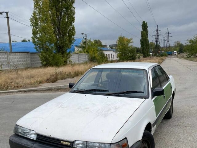 Белый Мазда 626, объемом двигателя 2 л и пробегом 111 тыс. км за 607 $, фото 1 на Automoto.ua