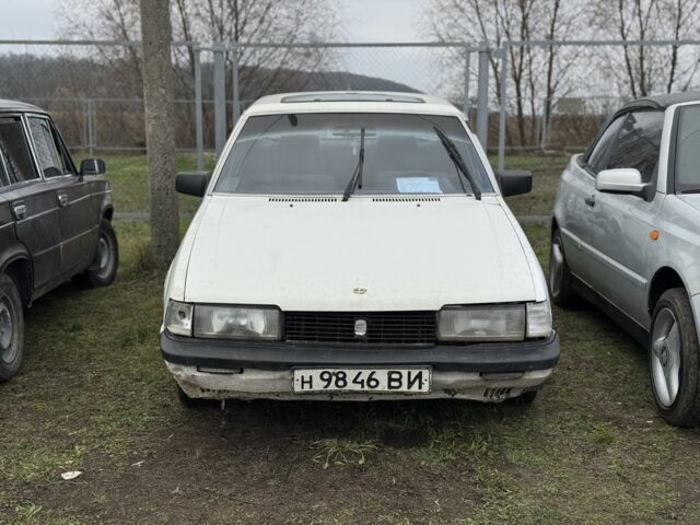 Белый Мазда 626, объемом двигателя 0 л и пробегом 300 тыс. км за 285 $, фото 1 на Automoto.ua