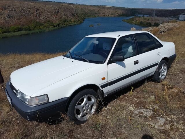 Білий Мазда 626, об'ємом двигуна 2 л та пробігом 346 тис. км за 897 $, фото 1 на Automoto.ua