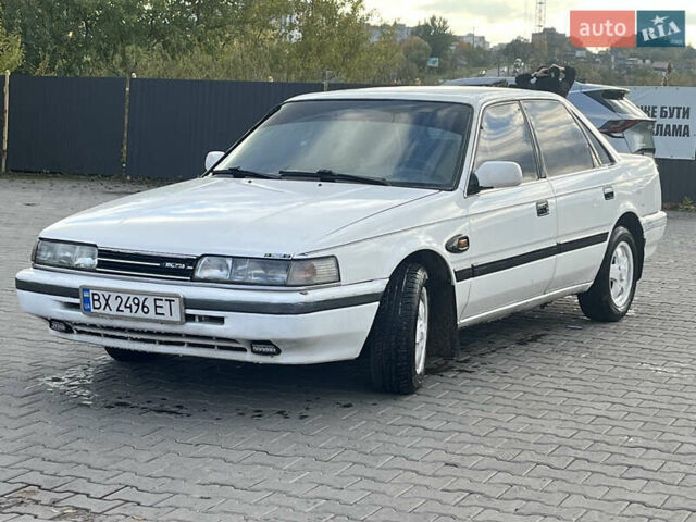 Белый Мазда 626, объемом двигателя 1.98 л и пробегом 300 тыс. км за 1100 $, фото 1 на Automoto.ua