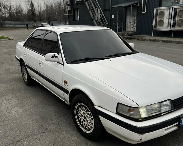 Білий Мазда 626, об'ємом двигуна 2 л та пробігом 412 тис. км за 2500 $, фото 1 на Automoto.ua