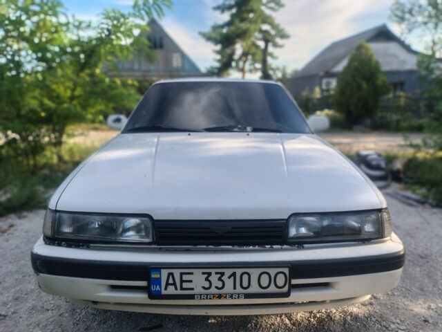 Білий Мазда 626, об'ємом двигуна 2 л та пробігом 422 тис. км за 953 $, фото 1 на Automoto.ua