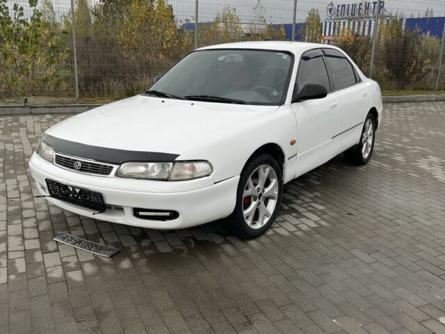 Белый Мазда 626, объемом двигателя 2 л и пробегом 300 тыс. км за 1099 $, фото 1 на Automoto.ua