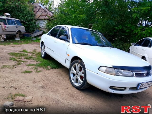 Белый Мазда 626, объемом двигателя 2 л и пробегом 315 тыс. км за 900 $, фото 1 на Automoto.ua