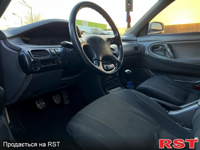 Белый Мазда 626, объемом двигателя 2 л и пробегом 124 тыс. км за 1300 $, фото 1 на Automoto.ua