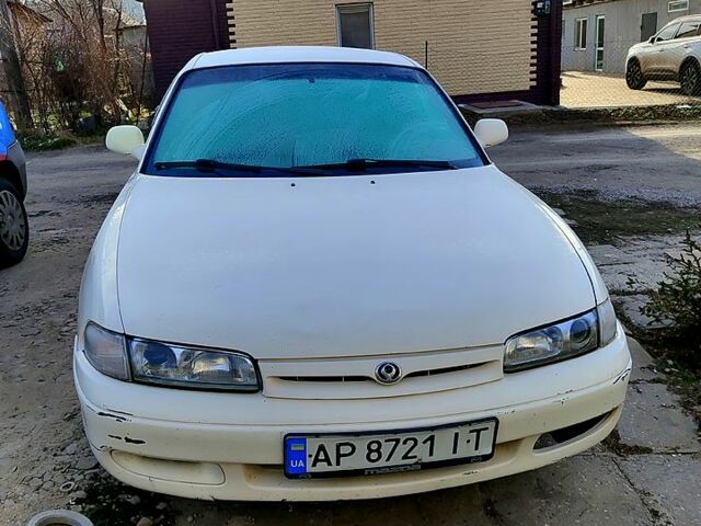 Білий Мазда 626, об'ємом двигуна 2 л та пробігом 400 тис. км за 1750 $, фото 1 на Automoto.ua