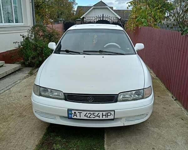 Белый Мазда 626, объемом двигателя 2.5 л и пробегом 330 тыс. км за 2100 $, фото 1 на Automoto.ua