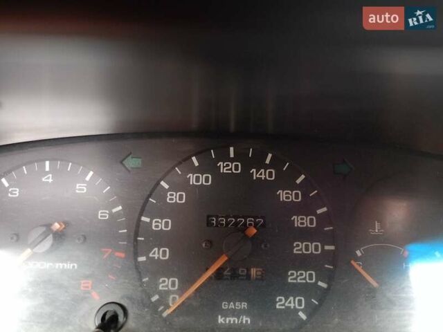 Белый Мазда 626, объемом двигателя 2.5 л и пробегом 330 тыс. км за 2300 $, фото 1 на Automoto.ua