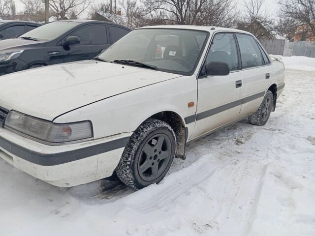 Белый Мазда 626, объемом двигателя 0 л и пробегом 500 тыс. км за 900 $, фото 1 на Automoto.ua