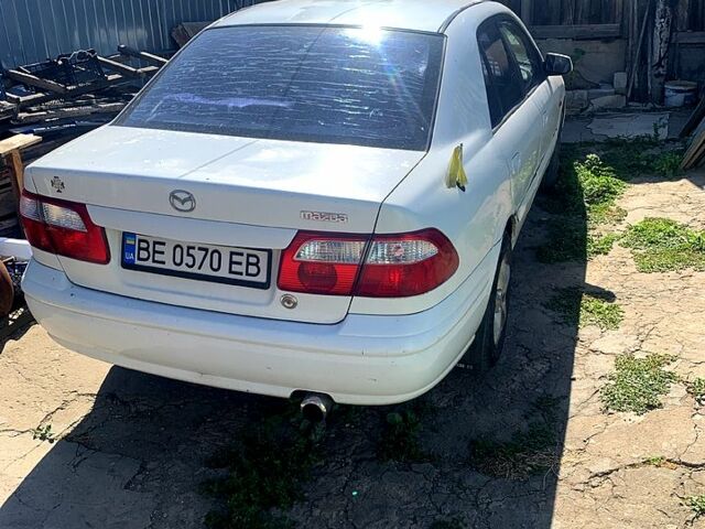 Белый Мазда 626, объемом двигателя 1.8 л и пробегом 292 тыс. км за 3200 $, фото 1 на Automoto.ua