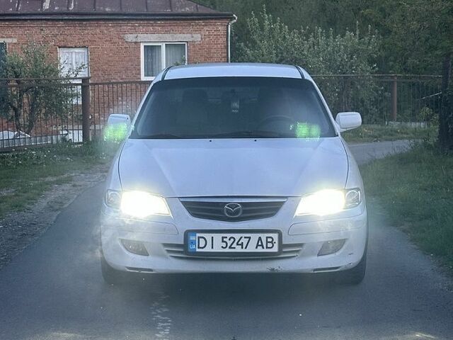 Белый Мазда 626, объемом двигателя 2 л и пробегом 309 тыс. км за 801 $, фото 1 на Automoto.ua