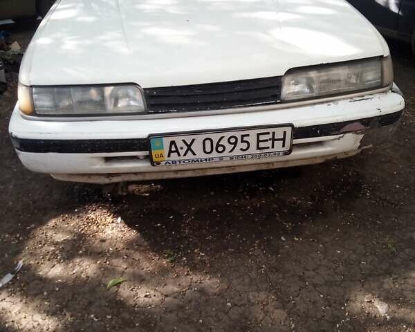 Білий Мазда 626, об'ємом двигуна 2.2 л та пробігом 337 тис. км за 1400 $, фото 1 на Automoto.ua