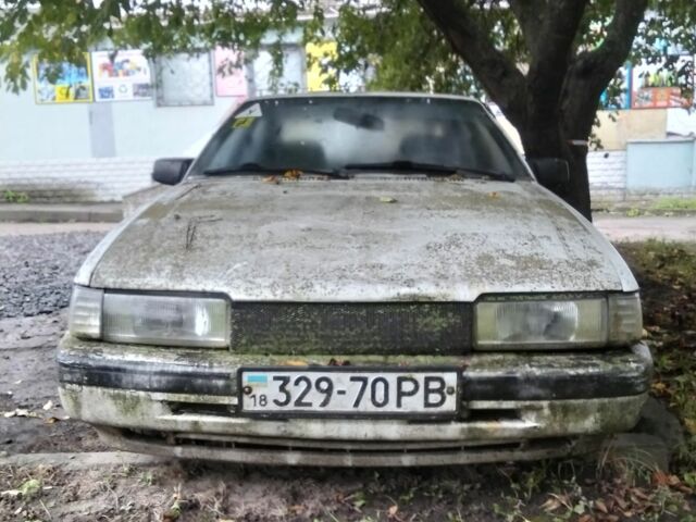 Белый Мазда 626, объемом двигателя 0 л и пробегом 400 тыс. км за 250 $, фото 1 на Automoto.ua