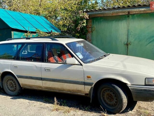 Белый Мазда 626, объемом двигателя 2 л и пробегом 194 тыс. км за 1300 $, фото 1 на Automoto.ua