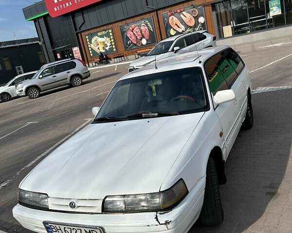 Белый Мазда 626, объемом двигателя 2 л и пробегом 358 тыс. км за 1400 $, фото 1 на Automoto.ua