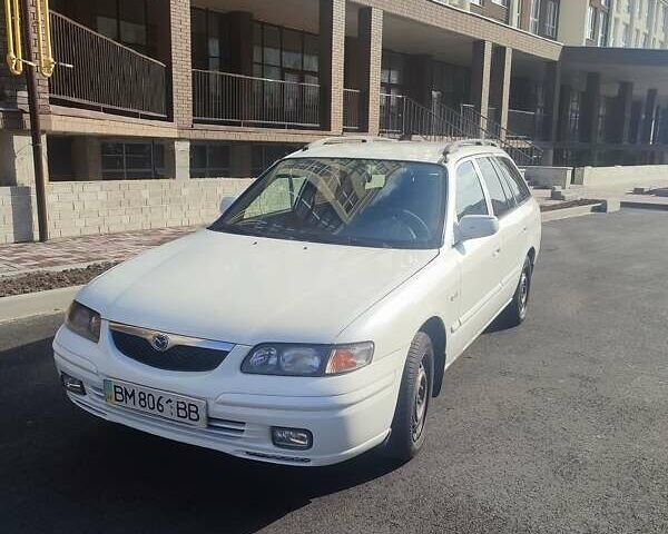 Белый Мазда 626, объемом двигателя 2 л и пробегом 610 тыс. км за 1750 $, фото 1 на Automoto.ua