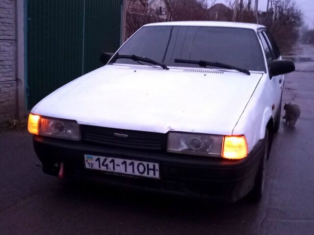 Білий Мазда 626, об'ємом двигуна 20 л та пробігом 407 тис. км за 1450 $, фото 1 на Automoto.ua