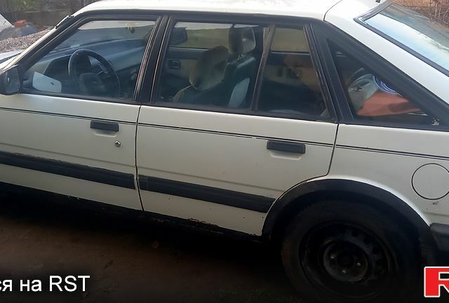 Білий Мазда 626, об'ємом двигуна 2 л та пробігом 350 тис. км за 1100 $, фото 1 на Automoto.ua