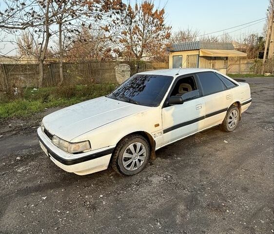 Білий Мазда 626, об'ємом двигуна 2 л та пробігом 225 тис. км за 1100 $, фото 1 на Automoto.ua