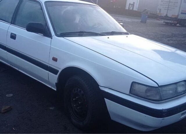 Белый Мазда 626, объемом двигателя 2 л и пробегом 255 тыс. км за 1100 $, фото 1 на Automoto.ua