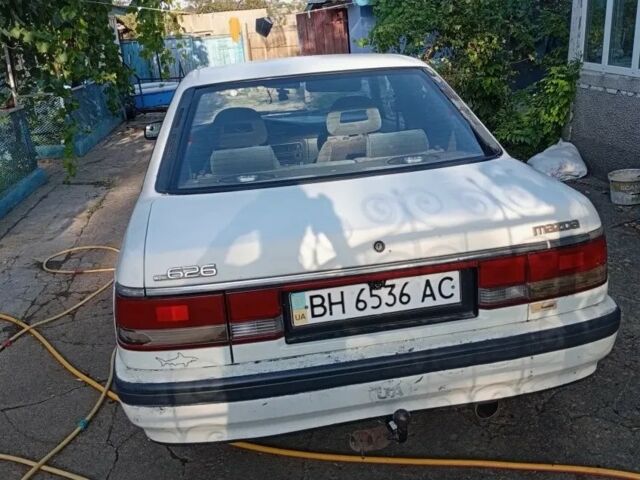 Бежевый Мазда 626, объемом двигателя 2 л и пробегом 200 тыс. км за 850 $, фото 1 на Automoto.ua