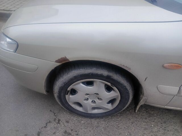 Бежевый Мазда 626, объемом двигателя 2 л и пробегом 300 тыс. км за 2800 $, фото 1 на Automoto.ua