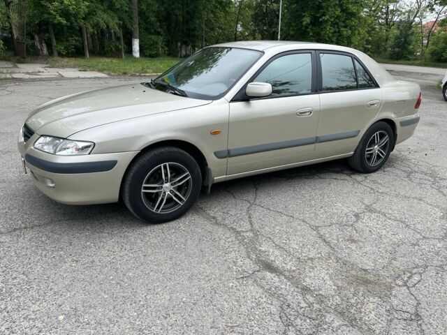 Бежевий Мазда 626, об'ємом двигуна 2 л та пробігом 313 тис. км за 2800 $, фото 1 на Automoto.ua