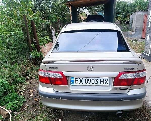 Бежевый Мазда 626, объемом двигателя 2 л и пробегом 290 тыс. км за 3500 $, фото 1 на Automoto.ua