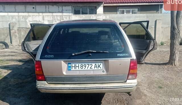 Бежевый Мазда 626, объемом двигателя 2 л и пробегом 547 тыс. км за 1900 $, фото 1 на Automoto.ua