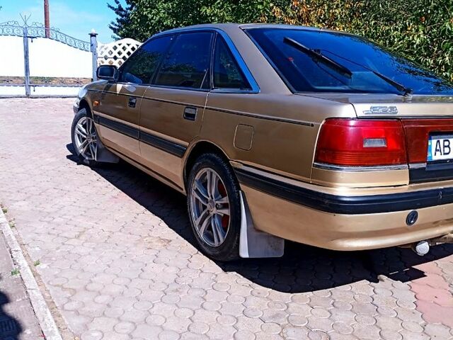 Бежевый Мазда 626, объемом двигателя 2 л и пробегом 500 тыс. км за 1150 $, фото 1 на Automoto.ua