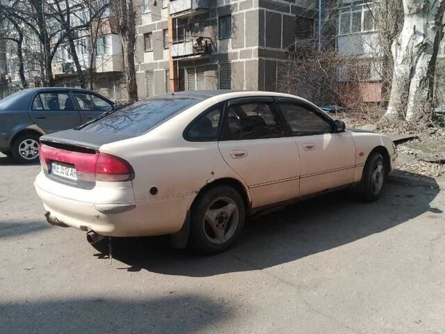 Бежевий Мазда 626, об'ємом двигуна 1.8 л та пробігом 400 тис. км за 639 $, фото 1 на Automoto.ua