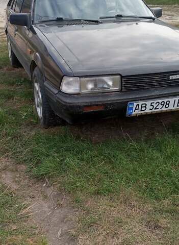 Черный Мазда 626, объемом двигателя 2 л и пробегом 450 тыс. км за 599 $, фото 1 на Automoto.ua