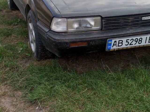 Черный Мазда 626, объемом двигателя 2 л и пробегом 450 тыс. км за 557 $, фото 1 на Automoto.ua