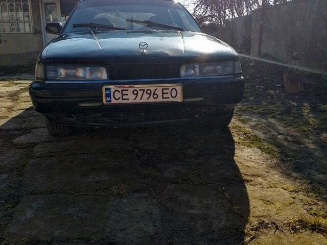Чорний Мазда 626, об'ємом двигуна 2 л та пробігом 2 тис. км за 450 $, фото 1 на Automoto.ua