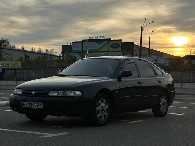 Черный Мазда 626, объемом двигателя 2.5 л и пробегом 483 тыс. км за 1200 $, фото 1 на Automoto.ua