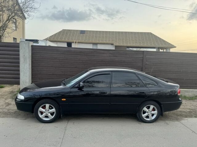 Черный Мазда 626, объемом двигателя 2 л и пробегом 3 тыс. км за 2500 $, фото 1 на Automoto.ua