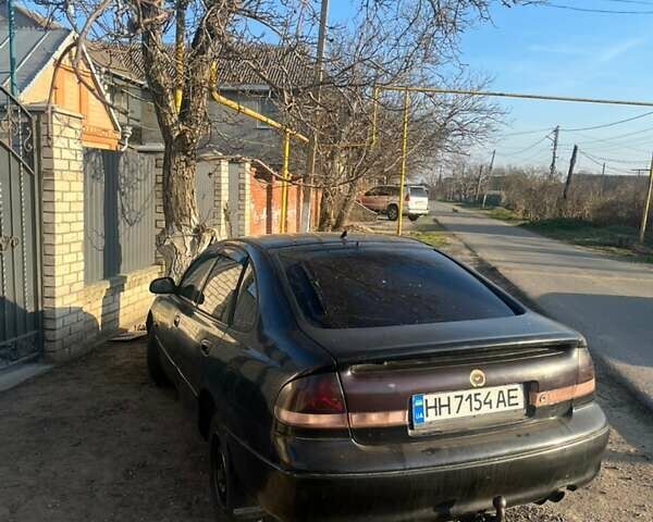 Чорний Мазда 626, об'ємом двигуна 2 л та пробігом 278 тис. км за 1000 $, фото 1 на Automoto.ua