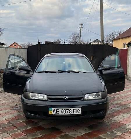 Чорний Мазда 626, об'ємом двигуна 2 л та пробігом 155 тис. км за 1500 $, фото 1 на Automoto.ua