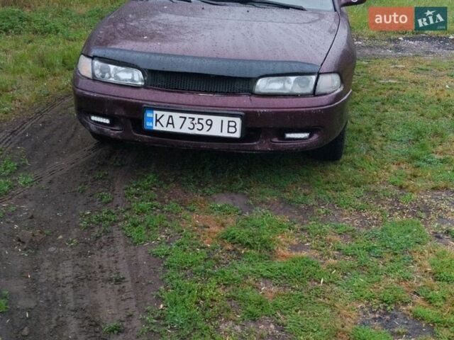 Черный Мазда 626, объемом двигателя 2 л и пробегом 416 тыс. км за 1700 $, фото 1 на Automoto.ua