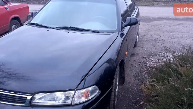 Чорний Мазда 626, об'ємом двигуна 2 л та пробігом 100 тис. км за 2800 $, фото 1 на Automoto.ua