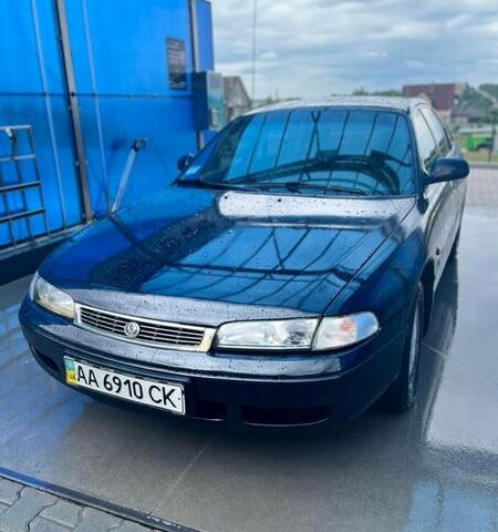 Черный Мазда 626, объемом двигателя 1.8 л и пробегом 300 тыс. км за 1450 $, фото 1 на Automoto.ua