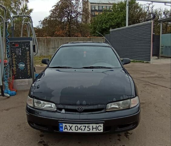 Чорний Мазда 626, об'ємом двигуна 1.8 л та пробігом 200 тис. км за 1800 $, фото 1 на Automoto.ua