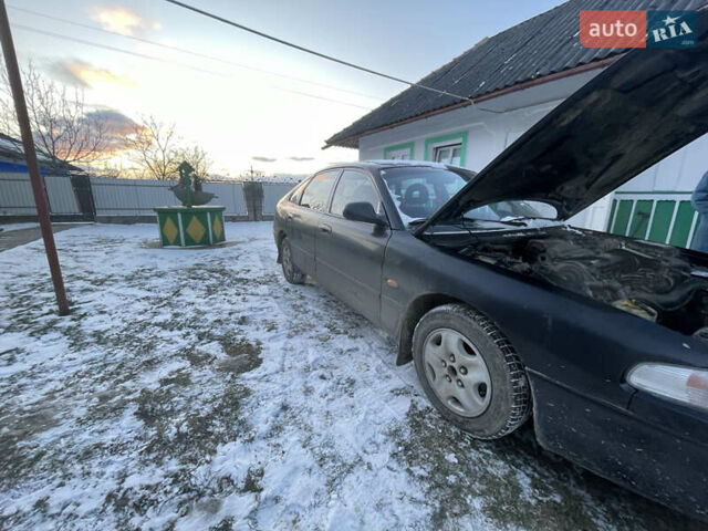 Чорний Мазда 626, об'ємом двигуна 1.99 л та пробігом 200 тис. км за 708 $, фото 1 на Automoto.ua