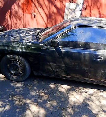 Черный Мазда 626, объемом двигателя 2.2 л и пробегом 100 тыс. км за 750 $, фото 1 на Automoto.ua