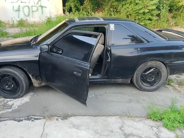 Черный Мазда 626, объемом двигателя 2 л и пробегом 100 тыс. км за 781 $, фото 1 на Automoto.ua