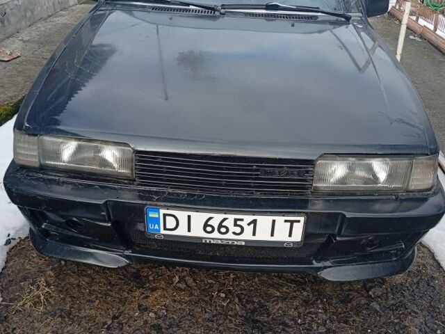 Черный Мазда 626, объемом двигателя 2 л и пробегом 28 тыс. км за 1016 $, фото 1 на Automoto.ua